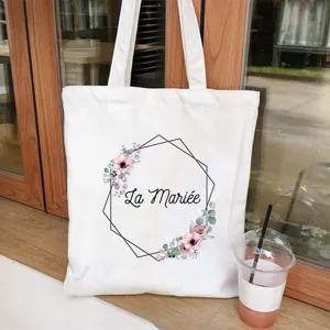 White canvas tote bag with floral geometric print, casual large capacity shoulder shopping bag.