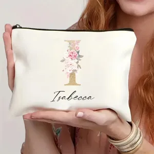 Bolsa de maquillaje personalizada con letra floral y cremallera para uso diario.