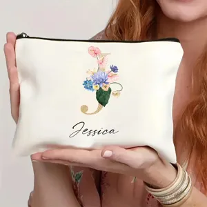 Bolso de maquillaje personalizado con letra floral y cremallera para uso diario.