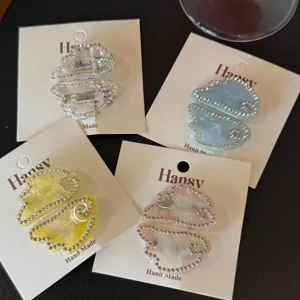 Acetate hair clips featuring cute wing shapes and sparkling rhinestones for stylish daily wear.