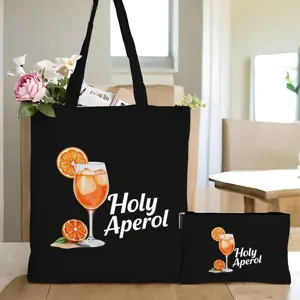 Detailansicht des schwarzen Canvas-Taschensets mit orangem Cocktail-Print und schönen Blumen.