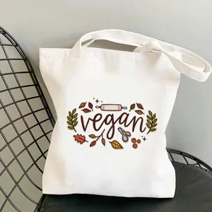 Weißer Segeltuchtaschen Shopper mit veganem Herbstblatt-Druck, lässige Umhängetasche für den Alltag.