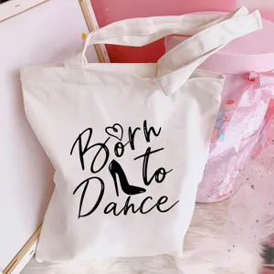 White canvas tote bag with Born to Dance print, casual shoulder bag for daily use.