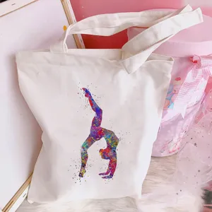 Details of the aesthetic ballet dancer print canvas tote bag, featuring durable fabric and straps.