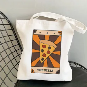 Tarot pizza print canvas tote bag detail, featuring unique front graphic and durable fabric.