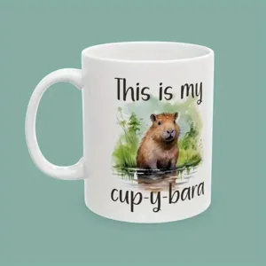 Detailansicht der weißen Keramiktasse mit einem süßen Wasserschwein und tollem Spruch.