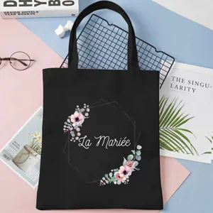 Black canvas tote bag with floral geometric print, large capacity casual shoulder bag.