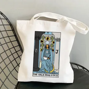 White canvas tote bag featuring tarot card high priestess graphic print for daily shopping.