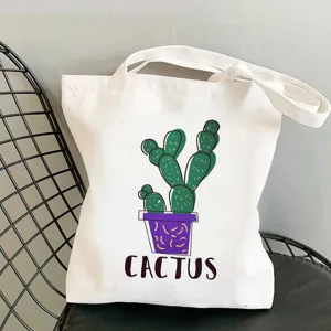 Borsa shopper in tela bianca con stampa di cactus verde, elegante borsa a spalla per uso quotidiano.