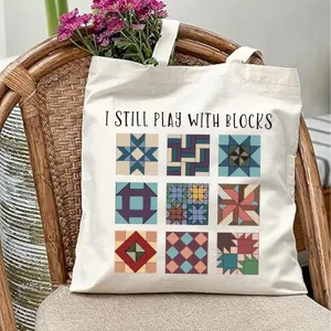Tsanta tote apo kamva me diaskedastiko sxedio block quilt kai frasi, antoxhs tsanta.