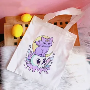 Pastel Goth cute purple cat canvas tote bag, detailed view of the unique printed graphic design.