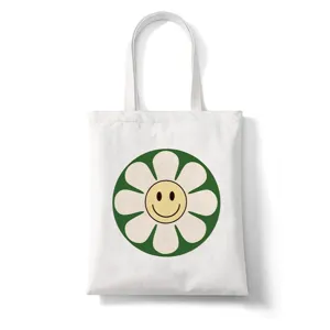Gedetailleerd overzicht van witte canvas tas met retro groene margriet smiley patroon.