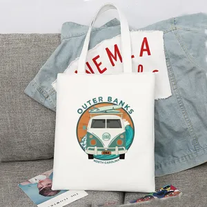 Lässiger weißer Segeltuch Shopper mit Outer Banks Druck, strapazierfähige Umhängetasche.