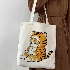 Bolso tote de lona estampada bonito, vista detallada que muestra el lindo diseño de gato y textura.