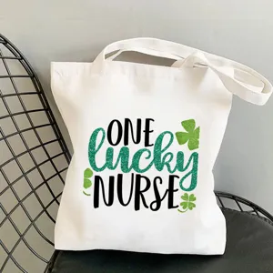 Weißer Segeltuchtaschen Shopper mit grünem Krankenschwester Druck für Alltag und Einkauf.