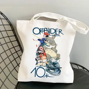 White canvas tote bag featuring classic anime characters and stylish print design.