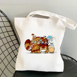 White canvas tote bag featuring cute anime character print casual shoulder shopping bag for daily use.