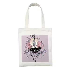 Detailopname van de schattige satan kat grafische print op witte canvas tas stof.