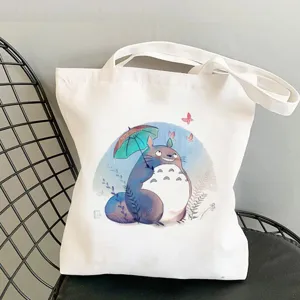 Cute Totoro printed canvas tote bag, casual shoulder handbag for daily shopping and travel.