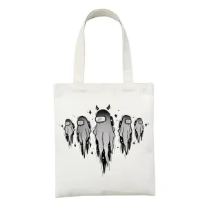 Gedetailleerd overzicht van witte canvas tas met schattige spookachtige ruimte cartoonprint.