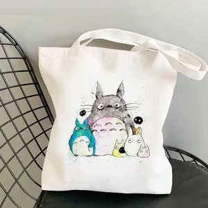 Cute Totoro printed canvas tote bag, casual shoulder shopping bag for daily use and travel.