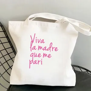 Lässige weiße Canvas Tragetasche mit pinkem spanischen Spruch, modische Umhängetasche.