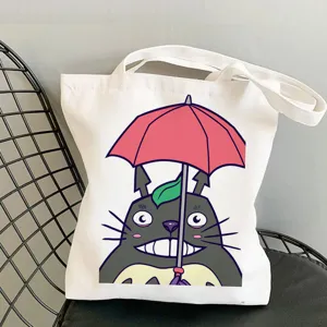 White canvas tote bag with cute anime character graphic, casual shoulder bag for daily use.