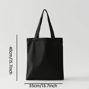 Zwarte katoenen canvas shopper tas vrijetijds shopping reistas met duidelijke afmetingen.