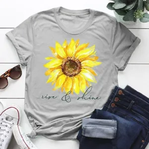 Grey short sleeve t-shirt with sunflower print and stylish text detail for daily wear.