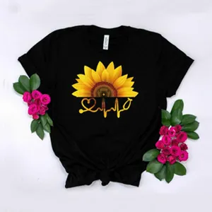 Detailed view of black women short sleeve t-shirt featuring sunflower stethoscope heartbeat graphic.