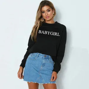 Detailed close-up view of the casual black sweatshirt featuring bold white letter print.