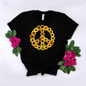 Black short sleeve t-shirt featuring a sunflower peace sign graphic and stylish front knot design.