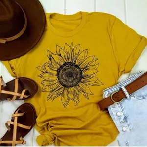 Casual yellow t-shirt featuring a black sunflower graphic print with short sleeves.