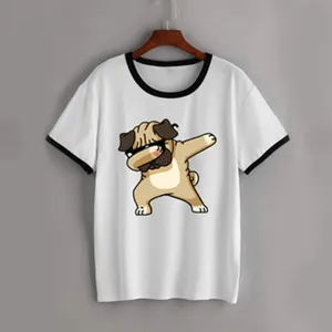 Close-up of white ringer t-shirt featuring a cute cartoon pug dab graphic and contrast black trim.