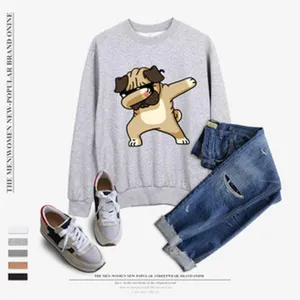 Grey crewneck sweatshirt with cute pug dog graphic print, paired with ripped jeans and casual shoes.