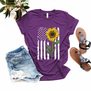 Detalle de camiseta morada de manga corta con gráfico de girasol y bandera de EE. UU.