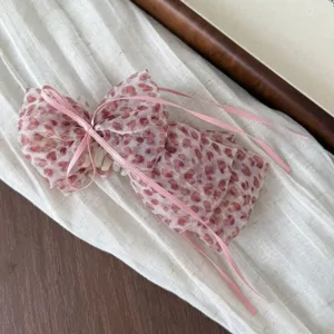 Korean style mesh hair claw with cute bow, pink leopard print hair accessory for women.