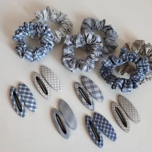 Korean style blue plaid scrunchies and snap hair clips set, cute fabric hair accessories detail.