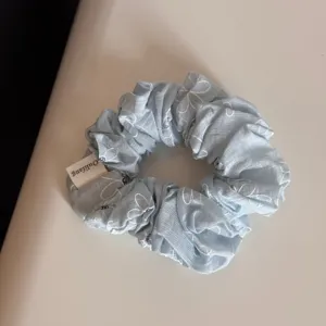 Korean style sea salt blue daisy large hair scrunchie detail view, extra large lazy style hair band.