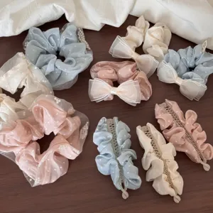 Korean Morandi hair scrunchies and claw clips with heart patterns, elegant hair accessories.