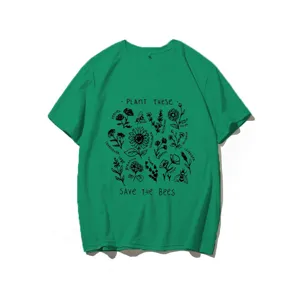 Detailed view of green short-sleeve t-shirt featuring black botanical plant and bee print graphic.