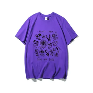 Close-up detail of the botanical print graphic and slogan on the purple cotton t-shirt.