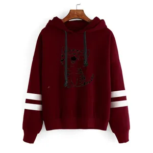 Detailed view of the burgundy hooded sweatshirt featuring a cute cat print and stylish double arm stripes.