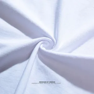 Detailed view of white women short sleeve t-shirt fabric texture and soft cotton material.