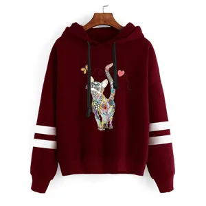 Burgundy pullover hoodie with geometric cat graphic and double sleeve stripes for winter.
