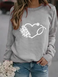 Grauer Pullover mit Rundhalsausschnitt und süßem medizinischem Stethoskop-Herz-Blumen-Print.