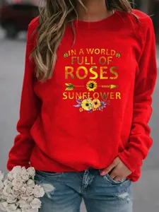 Dames rode ronde hals sweatshirt met zonnebloem print en inspirerende Engelse tekst.
