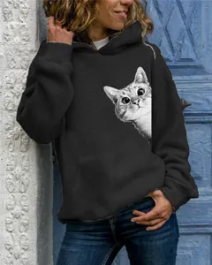 Detail view of the stylish black long-sleeve hooded sweatshirt featuring a cute peeking cat graphic print.