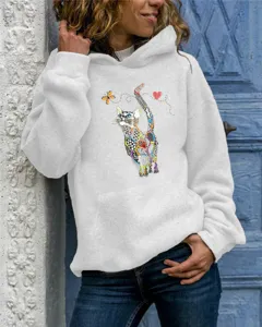 Detailed shot of a casual women's grey hoodie featuring an artistic colorful cat print.