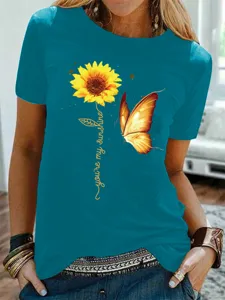 Casual dames teal korte mouw t-shirt met een mooie zonnebloem en vlinder grafische print.